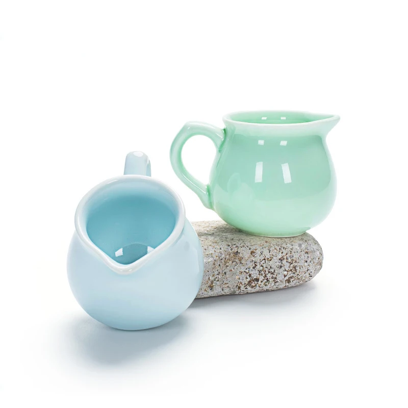 Exquisite Celadon fair tea pot, blue fair teapot,kung fu teacup, handmade tea cup,Japanese-style teaset tea accessories 140ml
Exquisite Celadon fair tea pot, blue fair teapot,kung fu teacup, handmade tea cup,Japanese-style teaset tea accessories 140ml