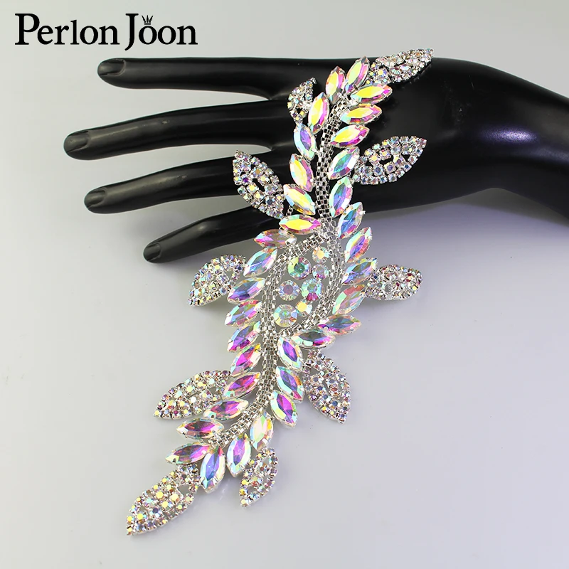 1pcs AB color crystal leaf long patch AB rhinestone glass welding flower silver decal for wedding boots decorative accessories
1pcs AB color crystal leaf long patch AB rhinestone glass welding flower silver decal for wedding boots decorative accessories