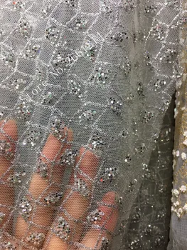 shining glued glitter sequins lace fabric in silver color BZL-91212 african tulle mesh fabric for party dress with glitter
shining glued glitter sequins lace fabric in silver color BZL-91212 african tulle mesh fabric for party dress with glitter