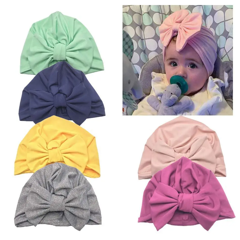 2019 Spring/summer Indian hat in solid color, baby pullover hat, bow turban cap 0-12M
2019 Spring/summer Indian hat in solid color, baby pullover hat, bow turban cap 0-12M