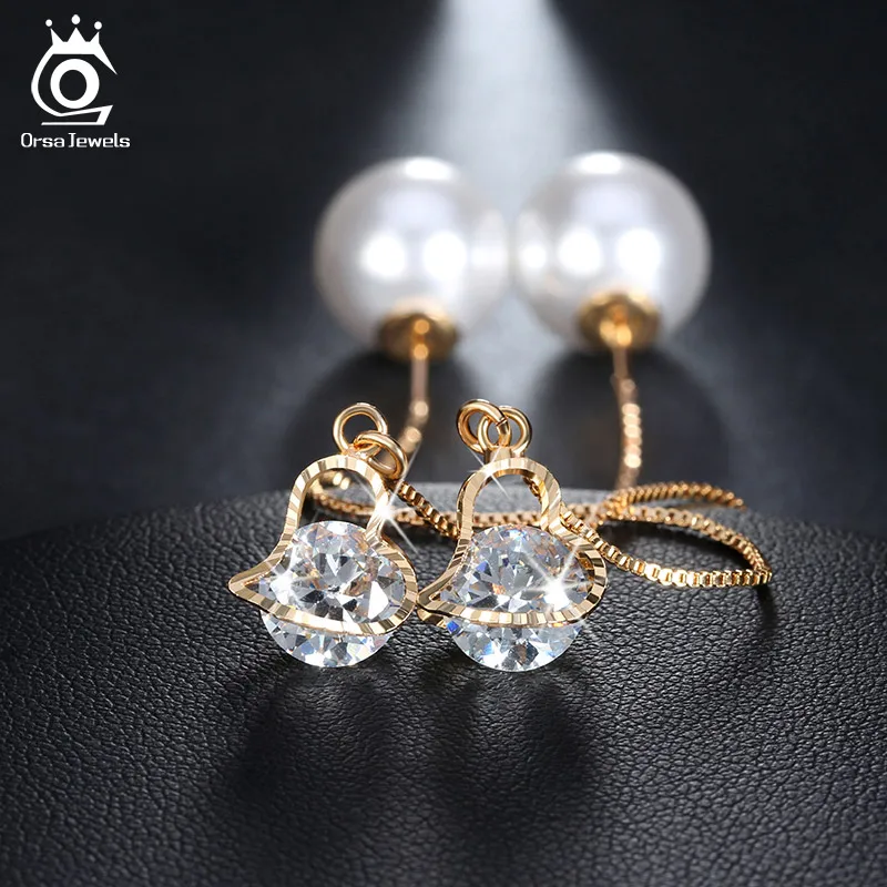 ORSA JEWELS Heart Shape Austrian Crystal Long Stud Earrings with Big Simulated Pearl Elegant Gold-Color Jewelry for Women OME26
ORSA JEWELS Heart Shape Austrian Crystal Long Stud Earrings with Big Simulated Pearl Elegant Gold-Color Jewelry for Women OME26