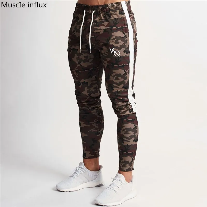 2019 Camouflage Joggers Casual Pants Fitness Men Sportswear Tracksuit Bottoms Skinny Sweatpants Trousers Gyms Jogger Track Pants
2019 Camouflage Joggers Casual Pants Fitness Men Sportswear Tracksuit Bottoms Skinny Sweatpants Trousers Gyms Jogger Track Pants