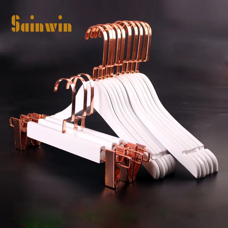 Sainwin 10pcs/lot wooden hangers for clothes rack adult/children wood hanger rose gold hooks luxury hanger (50pcs can LOGO)
Sainwin 10pcs/lot wooden hangers for clothes rack adult/children wood hanger rose gold hooks luxury hanger (50pcs can LOGO)