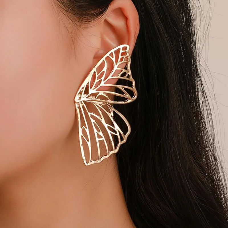 Timlee E071 Free shipping Exaggeration Popular Hollowing Out Butterfly Wing Metal Drop Earring Originality Jewelry wholesale
Timlee E071 Free shipping Exaggeration Popular Hollowing Out Butterfly Wing Metal Drop Earring Originality Jewelry wholesale