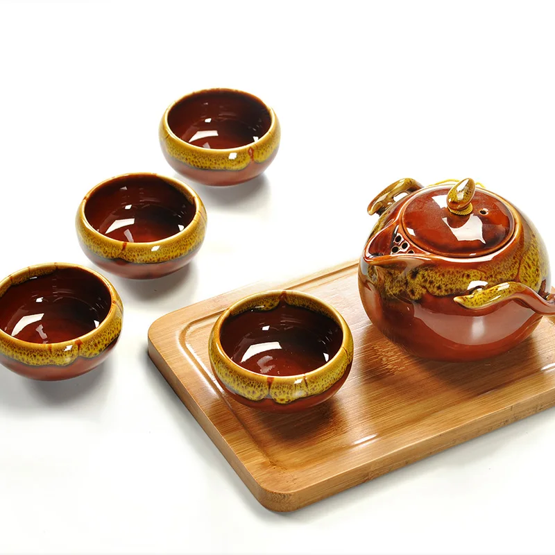 Japanese kiln change fast passenger cup, one pot, four cups Travel tea set Household outdoor carrying case Ceramic kungfu teapot
Japanese kiln change fast passenger cup, one pot, four cups Travel tea set Household outdoor carrying case Ceramic kungfu teapot