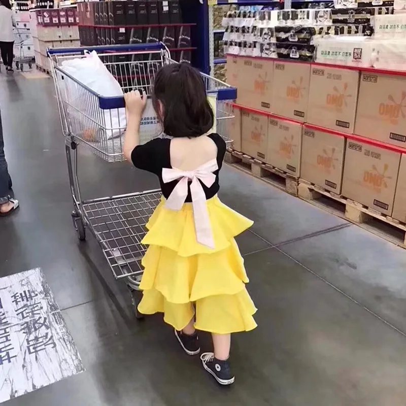 Summer girls 2 pcs set baby black tee +yellow layered skirt kids suit children clothes fashion backless bow lacing 2 to 8 yrs
Summer girls 2 pcs set baby black tee +yellow layered skirt kids suit children clothes fashion backless bow lacing 2 to 8 yrs