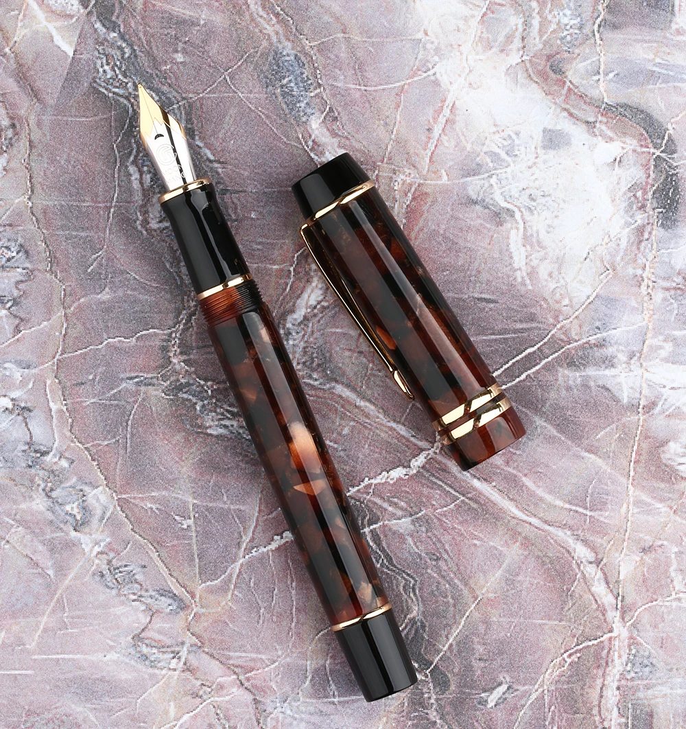 Moonman M600S Celluloid Red Fountain Pen MOONMAN Iridium Fine Nib 0.5mm Excellent Fashion Office Writing Gift Pen for Business
Moonman M600S Celluloid Red Fountain Pen MOONMAN Iridium Fine Nib 0.5mm Excellent Fashion Office Writing Gift Pen for Business