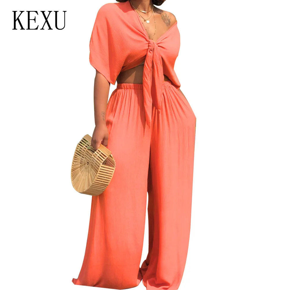 KEXU 2 Pieces Sets Sexy Deep V Neck Big Sleeve Tie-up Top and Wide Leg Pants Women Casual Loose Jumpsuits Summer Salopette Femme
KEXU 2 Pieces Sets Sexy Deep V Neck Big Sleeve Tie-up Top and Wide Leg Pants Women Casual Loose Jumpsuits Summer Salopette Femme