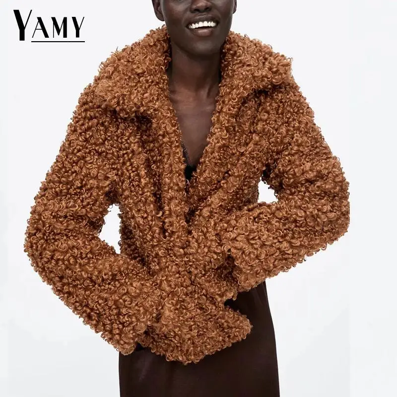 Winter faux fur coat women long sleeve warm teddy jacket Streetwear loose thicking cardigan fur jacket oversize outwear 2018
Winter faux fur coat women long sleeve warm teddy jacket Streetwear loose thicking cardigan fur jacket oversize outwear 2018