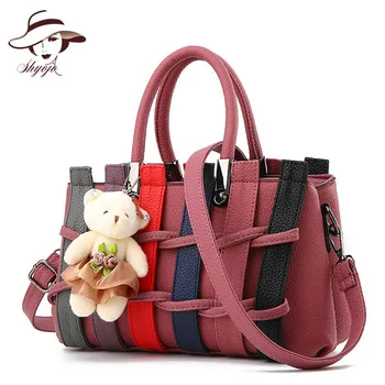 2020 New Fashion Women cross Pendant Handbags Ladies Totes Shoulder Bag Commuter Bag classic Lady Day Clutch Bag Gril Purse Bags
2020 New Fashion Women cross Pendant Handbags Ladies Totes Shoulder Bag Commuter Bag classic Lady Day Clutch Bag Gril Purse Bags