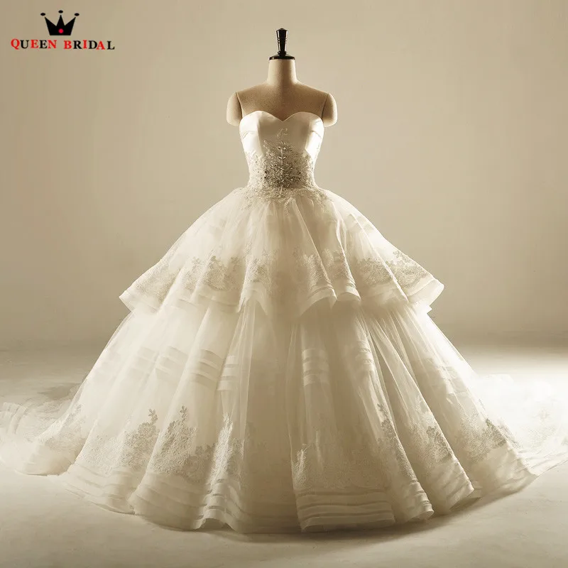 Empire Sweetheart Big Train Crystal Beaded Lace Luxury Long Wedding Dresses Bride 2018 Real Photo Wedding Gown Custom Made XH16
Empire Sweetheart Big Train Crystal Beaded Lace Luxury Long Wedding Dresses Bride 2018 Real Photo Wedding Gown Custom Made XH16