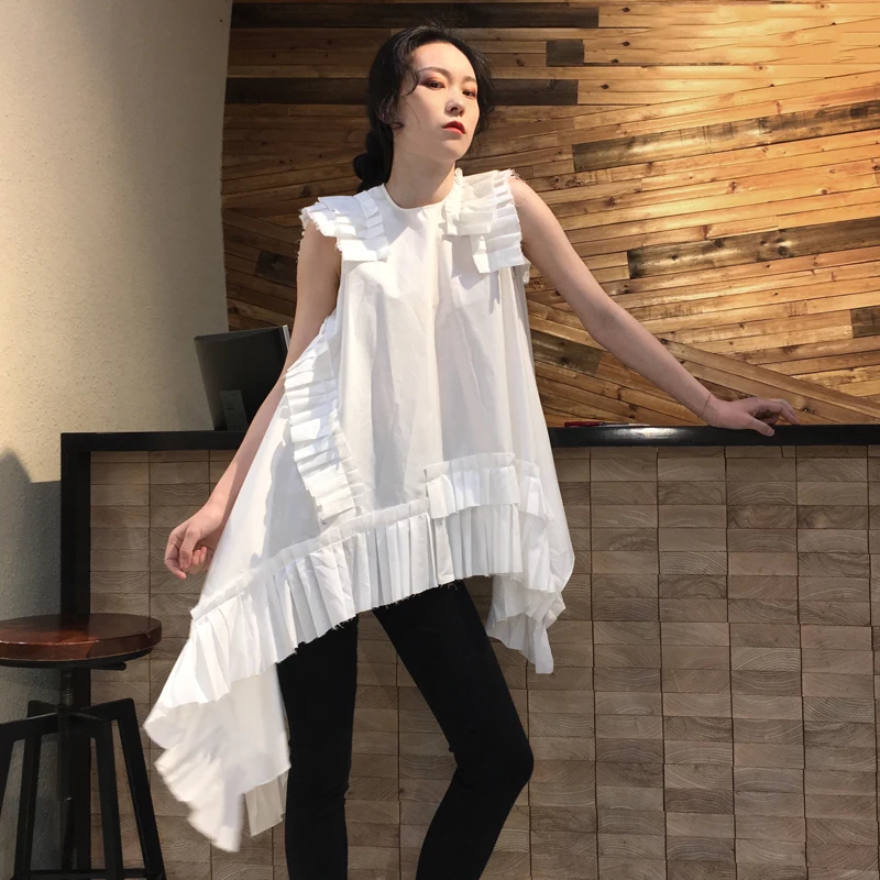 2019 Spring and Summer Elegant Women Shirts Lotus Leaf Edge Pleats Asymmetric Splicing Sleeveless Shoulder Shirt
2019 Spring and Summer Elegant Women Shirts Lotus Leaf Edge Pleats Asymmetric Splicing Sleeveless Shoulder Shirt