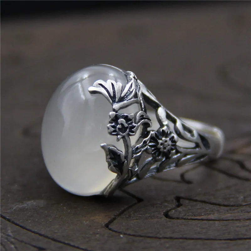 

wind restoring ancient ways ms natural white jade pulp Thai silver ring of carve patterns or designs on woodwork