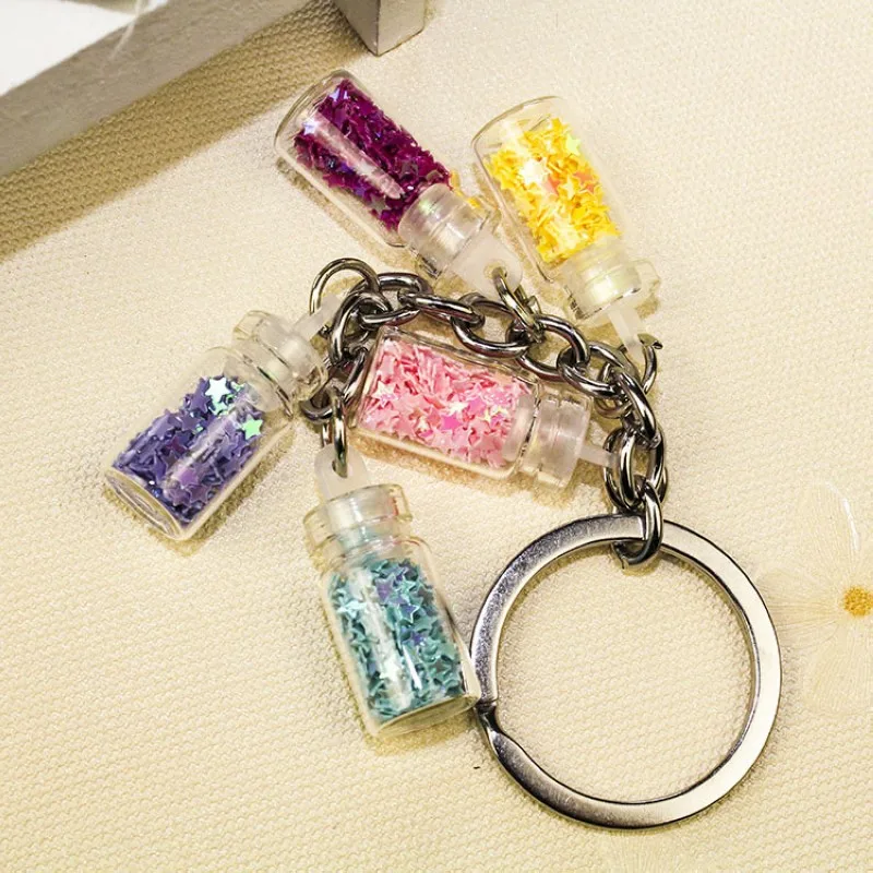 Colorized Shining Star Drift Bottle Keychain 5 Glass Bottle Keyrings For Lover Gifts Key Chain For Car Bags Key Rings
Colorized Shining Star Drift Bottle Keychain 5 Glass Bottle Keyrings For Lover Gifts Key Chain For Car Bags Key Rings