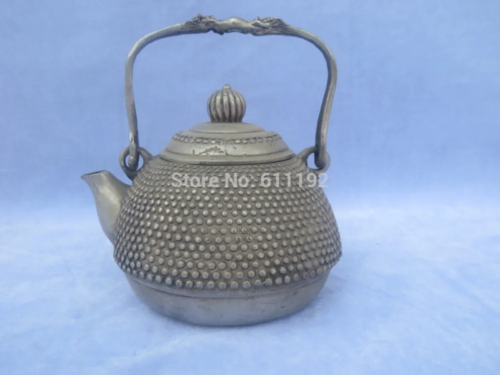 Exquisite Tibet silver hip flask,Hand-carved Religion Teapot Metal crafts,Antique jug
Exquisite Tibet silver hip flask,Hand-carved Religion Teapot Metal crafts,Antique jug