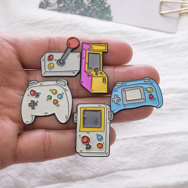 Gamepad joystick Street game console pins Cute Fun Badges Brooches Enamel pins for backpack friends Gifts Jewelry wholesale
Gamepad joystick Street game console pins Cute Fun Badges Brooches Enamel pins for backpack friends Gifts Jewelry wholesale