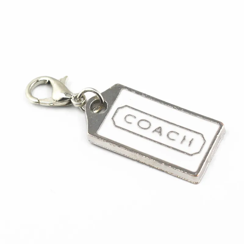 Hot selling 20pcs/lot white enamel COACH dangle charms with lobster clasp hanging charms for floating lockets necklace jewelry
Hot selling 20pcs/lot white enamel COACH dangle charms with lobster clasp hanging charms for floating lockets necklace jewelry