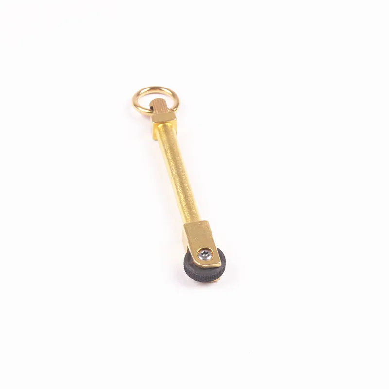 New Gold Outdoor Mini Brass Pulley Flint Fire Stick Igniter Wild Igniter Camping Tools
New Gold Outdoor Mini Brass Pulley Flint Fire Stick Igniter Wild Igniter Camping Tools