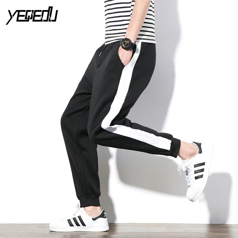 #7558 Black Harem sweatpants men Side white stripe Fashion Loose Casual trousers Hip hop Sweat pants Pantalon hombre Parkour
#7558 Black Harem sweatpants men Side white stripe Fashion Loose Casual trousers Hip hop Sweat pants Pantalon hombre Parkour