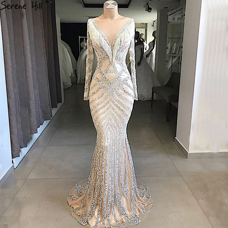 New Dubai Nude Slim Mermaid Evening Dresses 2019 Long Sleeves Beading Tassel Fashion Formal Evening Gown BLA6594
New Dubai Nude Slim Mermaid Evening Dresses 2019 Long Sleeves Beading Tassel Fashion Formal Evening Gown BLA6594