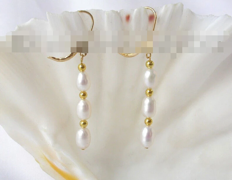 Hot sell Noble- hot sell new - 1304 baroque white freshwater cultured pearl dangle earrings
Hot sell Noble- hot sell new - 1304 baroque white freshwater cultured pearl dangle earrings