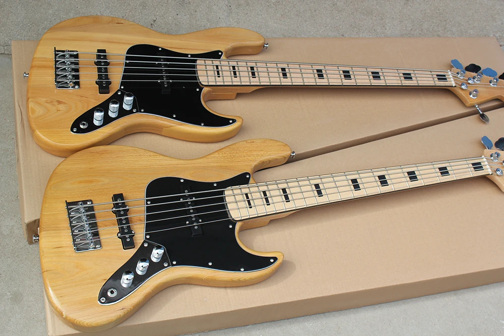 Factory wholesale 5 strings natural wood color ASH electric guitar with black pickguard,Maple fretboard with black binding
Factory wholesale 5 strings natural wood color ASH electric guitar with black pickguard,Maple fretboard with black binding
