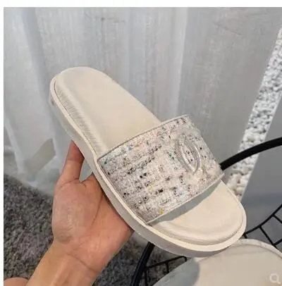 Summer 2019 women's slippers brand design CC flat slippers fashion Joker Beach slippers
Summer 2019 women's slippers brand design CC flat slippers fashion Joker Beach slippers