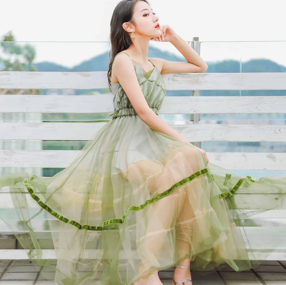 Korean version of the summer women's girl wind seaside mesh stitching dress color matching sling V-neck tulle women's dress
Korean version of the summer women's girl wind seaside mesh stitching dress color matching sling V-neck tulle women's dress