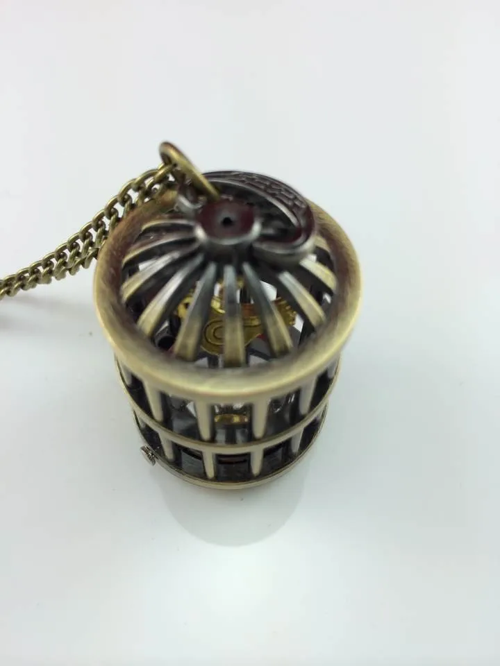 10pcs/lot Wholesale Hot Hunger Games Pocket watch necklace Vintage Charm Laugh at the bird birdcage pendant Pocket watch 2014
10pcs/lot Wholesale Hot Hunger Games Pocket watch necklace Vintage Charm Laugh at the bird birdcage pendant Pocket watch 2014