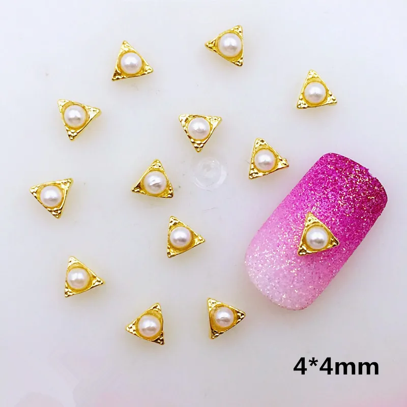 10Pcs/Lot 4*4mm Gold Triangle with Pearl Metal Alloy Nail Art Decorations Nail Stickers/Deco/Charms for Manicure
10Pcs/Lot 4*4mm Gold Triangle with Pearl Metal Alloy Nail Art Decorations Nail Stickers/Deco/Charms for Manicure