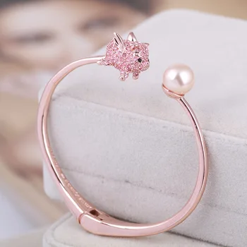 Europe and the United States new fashion personality pink rhinestone inlay personality flying pig pearl open bangle
Europe and the United States new fashion personality pink rhinestone inlay personality flying pig pearl open bangle