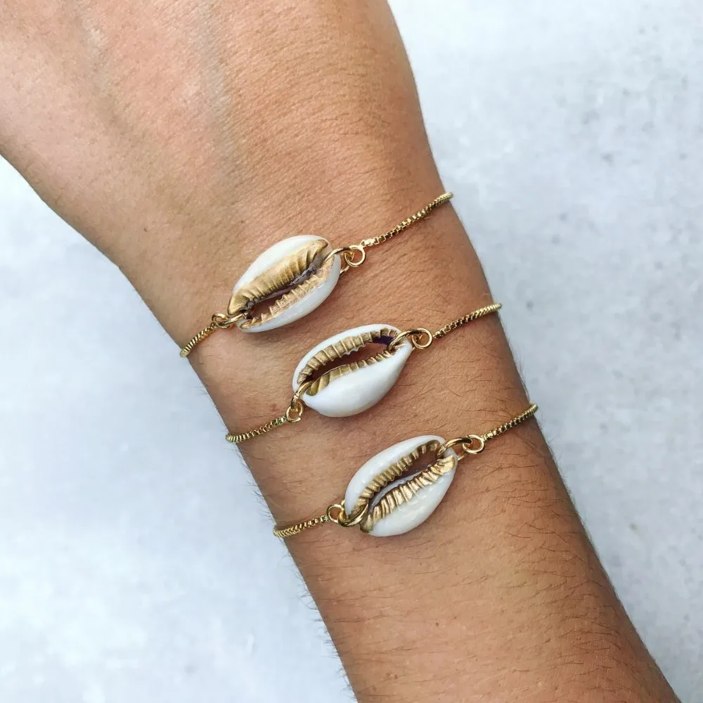 KBJW New Arrival Alloy Shell White Enamel Charm Bracelet Cowries Shell Bracelet Good Qaulity Jewelry Bracelets Gift for Women
KBJW New Arrival Alloy Shell White Enamel Charm Bracelet Cowries Shell Bracelet Good Qaulity Jewelry Bracelets Gift for Women