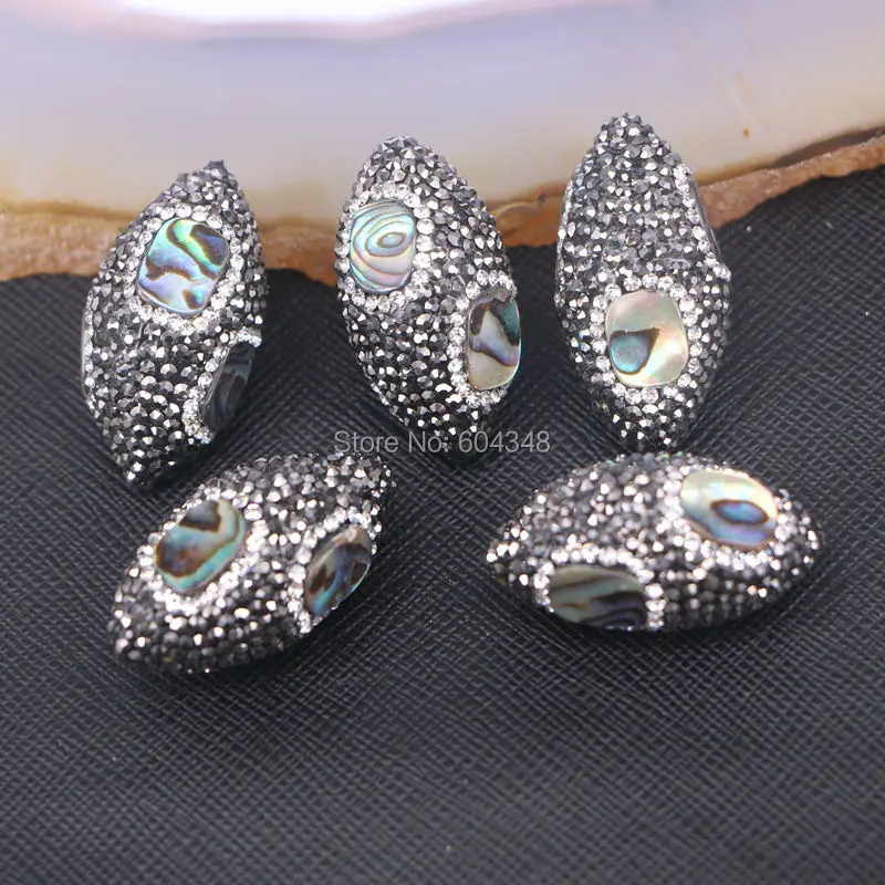 10pcs Rainbow Abalone Shell Beads Pave Crystal Rhinestone Shell Peacock Sea Shell Olive Gem stone Connector Jewelry
10pcs Rainbow Abalone Shell Beads Pave Crystal Rhinestone Shell Peacock Sea Shell Olive Gem stone Connector Jewelry