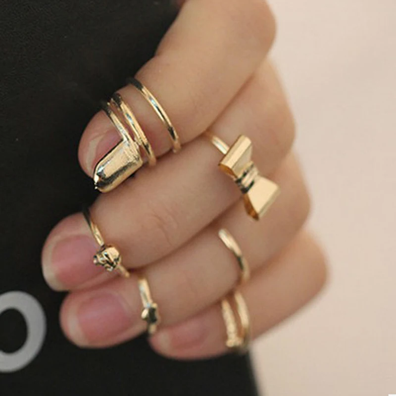 New Fashion 7pcs / Set Gold Color Sparkling Hollow Lotus Bow Vintage Ring Adjustable Nail Rings For Women
New Fashion 7pcs / Set Gold Color Sparkling Hollow Lotus Bow Vintage Ring Adjustable Nail Rings For Women