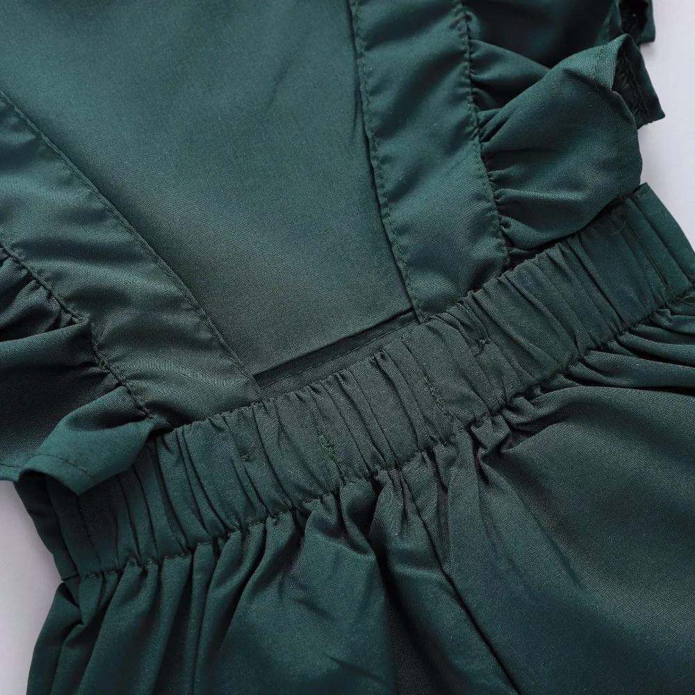 green romper baby girl