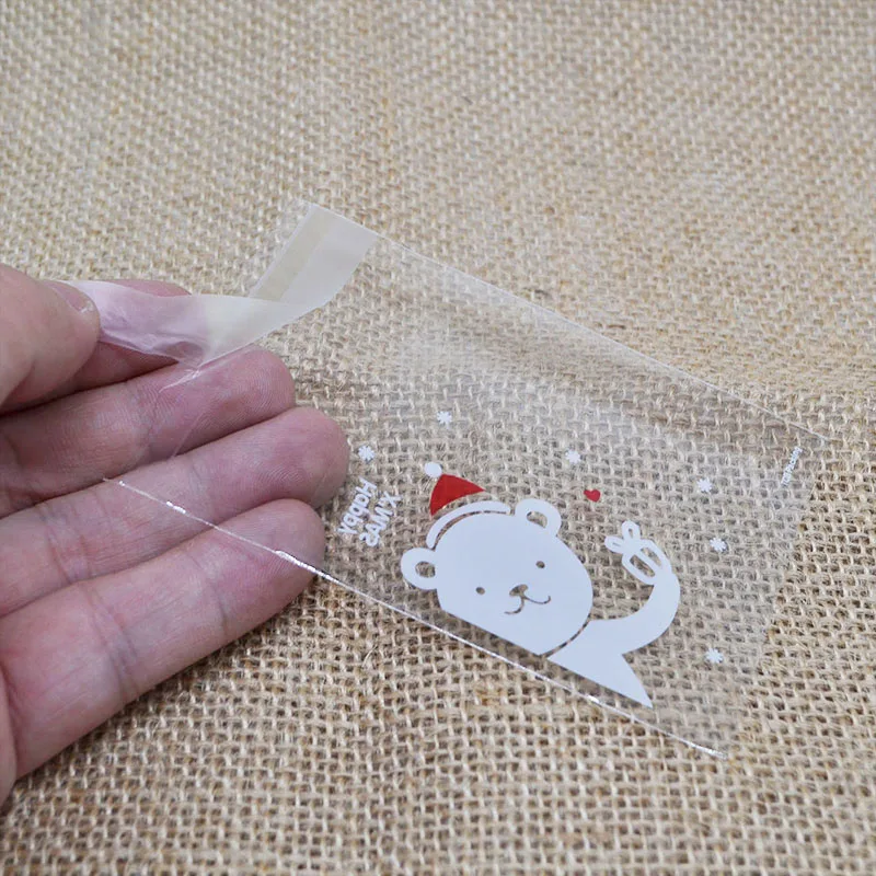 Christmas Candy Bags Cute 7*7cm Plastic Gift Cookies Packaging Bags Biscuits Snack Candy Cake Packing Bags for Xmas Decorations 
Christmas Candy Bags Cute 7*7cm Plastic Gift Cookies Packaging Bags Biscuits Snack Candy Cake Packing Bags for Xmas Decorations