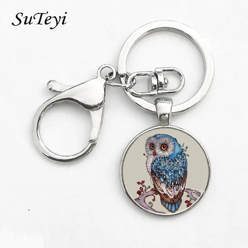 SUTEYI New Sweater Round Pendant Key Chain for Woman Vintage Large Glass Owl pendant Key Ring Fashion Jewelry Gift Wholesale
SUTEYI New Sweater Round Pendant Key Chain for Woman Vintage Large Glass Owl pendant Key Ring Fashion Jewelry Gift Wholesale