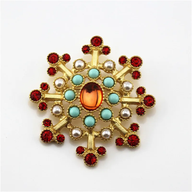 New European and American style inlaid red semi-precious stones imitation pearl matte gold alloy snowflake shaped brooch
New European and American style inlaid red semi-precious stones imitation pearl matte gold alloy snowflake shaped brooch