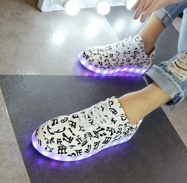 New Woman Casual Shoes Sneakers LED Flash Light 7 Colors Changed USB Charged Lace Up Note Printed Shoes White Size 38
New Woman Casual Shoes Sneakers LED Flash Light 7 Colors Changed USB Charged Lace Up Note Printed Shoes White Size 38