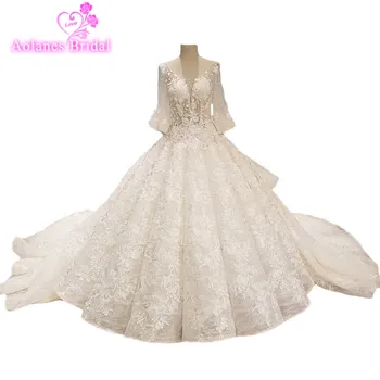 AOLANES 2018 Light Champange Lace Arabic Wedding Dresses Long Sleeves Scoop Royal Train Waves Ball Gown Backless Bridal Gowns
AOLANES 2018 Light Champange Lace Arabic Wedding Dresses Long Sleeves Scoop Royal Train Waves Ball Gown Backless Bridal Gowns