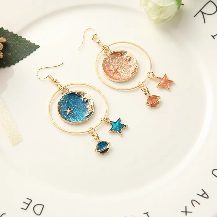 The new generous and elegant blue orange cosmic planet star crescent earring for girls in 2018
The new generous and elegant blue orange cosmic planet star crescent earring for girls in 2018