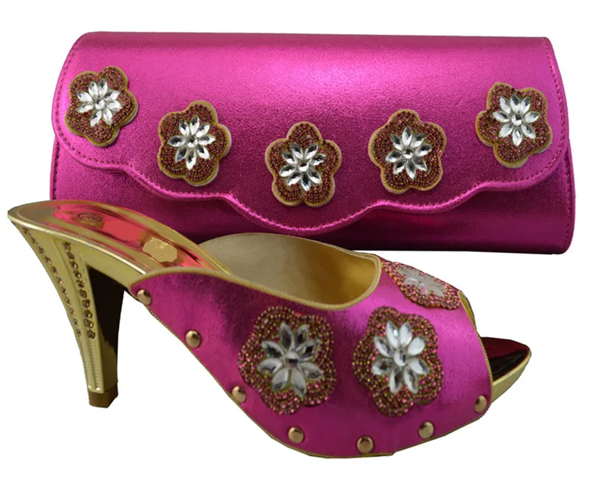 Beautiful African shoes match handbag set with rhinestone flower decoration for dress 1308-L36 fuchsia, high heel 8cm
Beautiful African shoes match handbag set with rhinestone flower decoration for dress 1308-L36 fuchsia, high heel 8cm