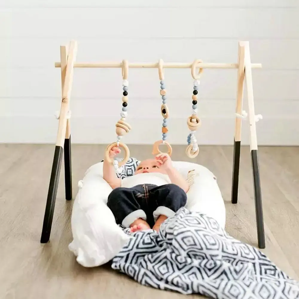 Baby bed rattle Room Decor Play Gym Toy Wooden Nursery Sensory Toy Gift Infant Room Clothes Rack Accessories Photography Props
Baby bed rattle Room Decor Play Gym Toy Wooden Nursery Sensory Toy Gift Infant Room Clothes Rack Accessories Photography Props