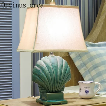 Mediterranean blue ceramic table lamp living room bedroom modern simple garden creative shell lamp free shipping
Mediterranean blue ceramic table lamp living room bedroom modern simple garden creative shell lamp free shipping