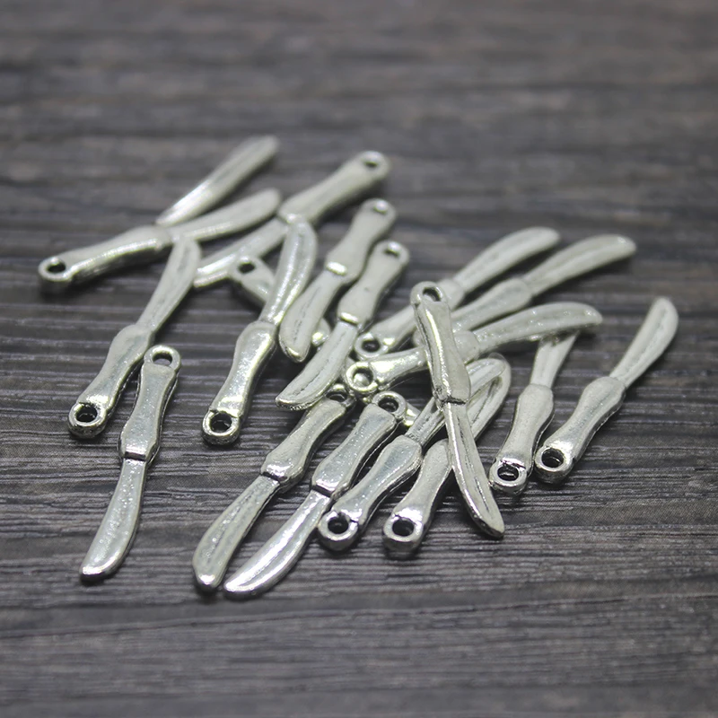 40pcs/ 25*3mm Knife charms,Antique silver Kitchen Charm pendants,Cutlery ,Chef, Dinner Knife
40pcs/ 25*3mm Knife charms,Antique silver Kitchen Charm pendants,Cutlery ,Chef, Dinner Knife