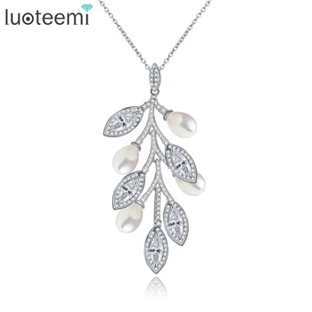 LUOTEEMI Women Casual Modern Marquise Cuting Zircon With Created Waterdrop Pearls Conected Leaf Shape Pendant Necklace
LUOTEEMI Women Casual Modern Marquise Cuting Zircon With Created Waterdrop Pearls Conected Leaf Shape Pendant Necklace
