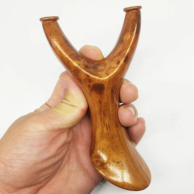 Slingshot resin hand-held catapult imitation wood left and right hand rubber band outdoor shooting new 2019 
Slingshot resin hand-held catapult imitation wood left and right hand rubber band outdoor shooting new 2019