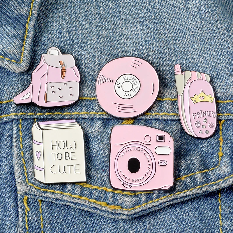 Backpack Book Camera Mobile phone CD Enamel Pin Custom Badges Pink Girl Brooches Lapel Pins Denim Shirt Collar Jewelry Gift
Backpack Book Camera Mobile phone CD Enamel Pin Custom Badges Pink Girl Brooches Lapel Pins Denim Shirt Collar Jewelry Gift