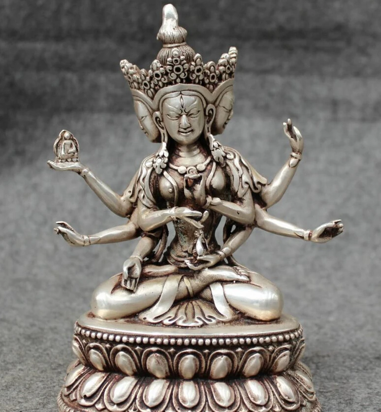 S4502 7" Tibet Silver Buddhism 3 Head 8 Arms Ushnishavijaya Namgyalma Buddha Statue D0317
S4502 7" Tibet Silver Buddhism 3 Head 8 Arms Ushnishavijaya Namgyalma Buddha Statue D0317