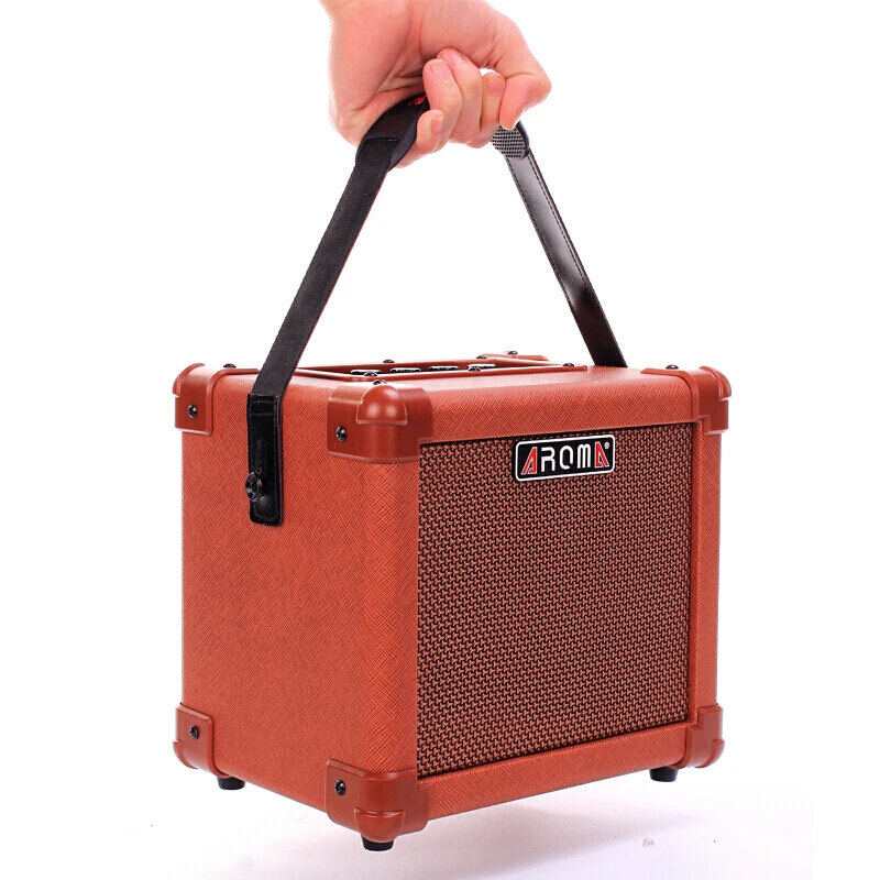 AROMA AG-10A Acoustic Guitar Amplifier Portable Guitar Amp Speaker 10W with Microphone Interface Audio Input
AROMA AG-10A Acoustic Guitar Amplifier Portable Guitar Amp Speaker 10W with Microphone Interface Audio Input